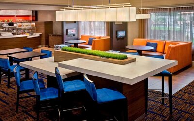 Dining area and workspace at Sonesta Select Boston Danvers.