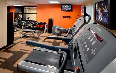 Fully equipped fitness center at Sonesta Select Boston Danvers.