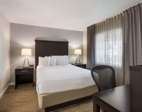 Day use room with work desk and private bathroom at Sonesta ES Suites Dulles Airport.