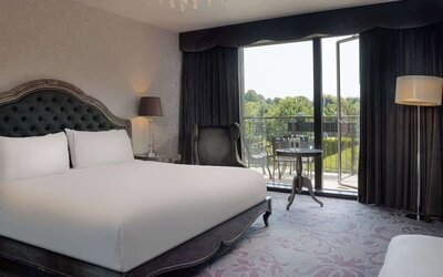 King room with balcony at Hilton London Syon Park.