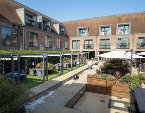 Hotel terrace and garden at Hilton London Syon Park.