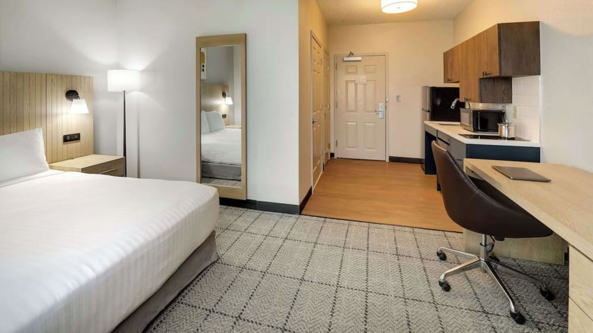 Day use room with work desk and private bathroom at Sonesta Simply Suites Baltimore BWI Airport.