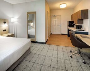 Day use room with work desk and private bathroom at Sonesta Simply Suites Baltimore BWI Airport.