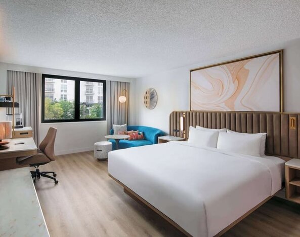 Bright and spacious day use room with work des at Sonesta Miami Airport.