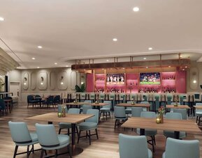 Hotel bar with lounge area at Sonesta Miami Airport.