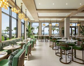 Stylish on-site restaurant at Embassy Suites By Hilton Panama City Beach Resort.