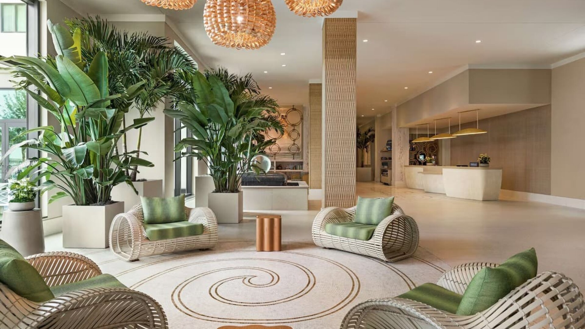 Beautiful lobby lounge at Embassy Suites By Hilton Panama City Beach Resort.