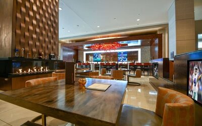 Dining area perfect for coworking at Hilton Dallas/ Plano Granite Park.