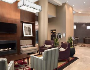 Lobby and coworking lounge at Embassy Suites By Hilton St. Louis Downtown.