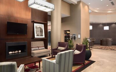 Lobby and coworking lounge at Embassy Suites By Hilton St. Louis Downtown.