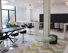 Lobby and coworking lounge at Liberty View Brooklyn Hotel.