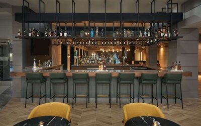 Hotel bar at The Chifley Houston, Tapestry Collection By Hilton.