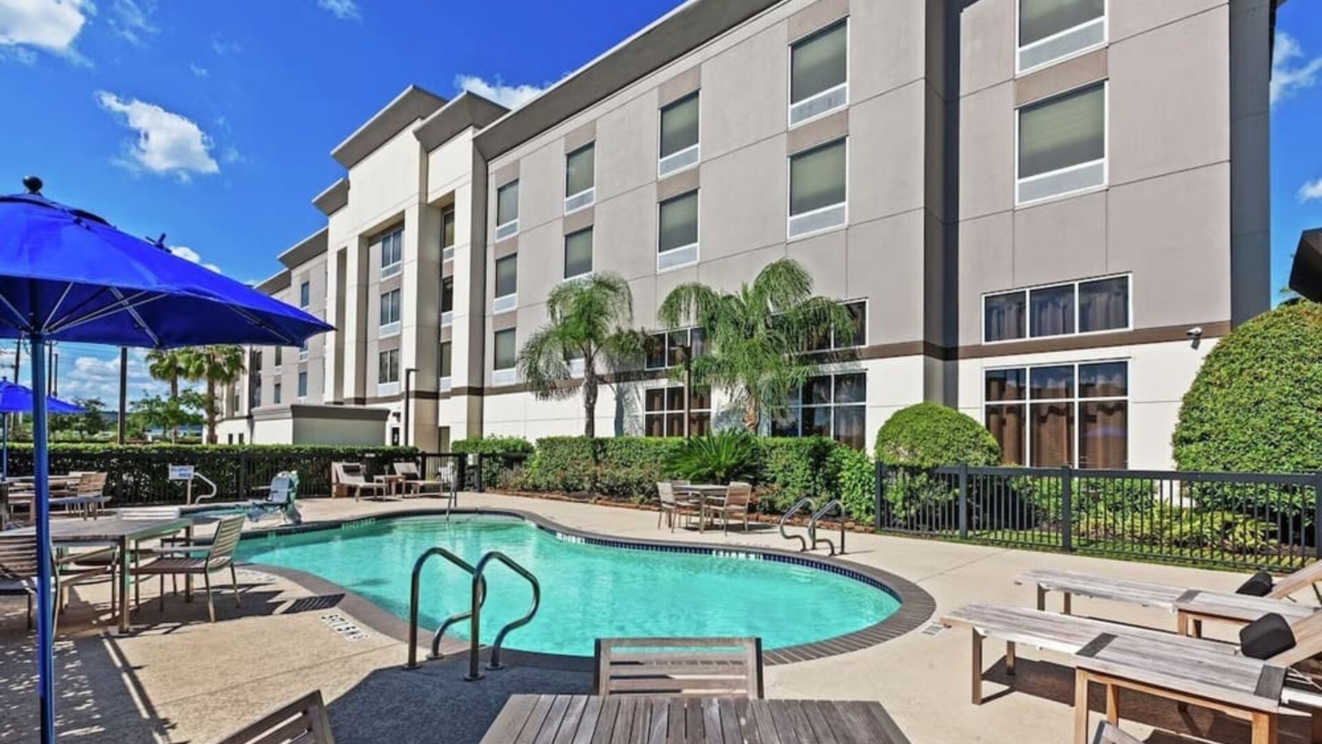 Outdoor pool at Hampton Inn & Suites Houston-Bush Intercontinental Aprt.