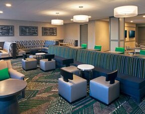 Coworking lounge at Homewood Suites By Hilton Los Angeles International Airport.