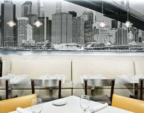 Dining area at Hilton Garden Inn New York/Times Square Central.