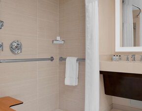 Private guest bathroom with shower at Hilton Garden Inn New York/Times Square Central