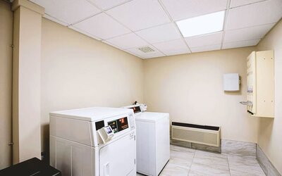 Laundry service available for guests at Hotel Inn Milwaukee.