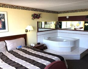 King suite with hot tub at Norwood Inn And Suites Worthington.