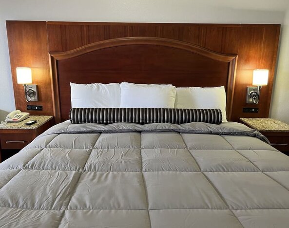 King bed at Casa Rosa Inn.