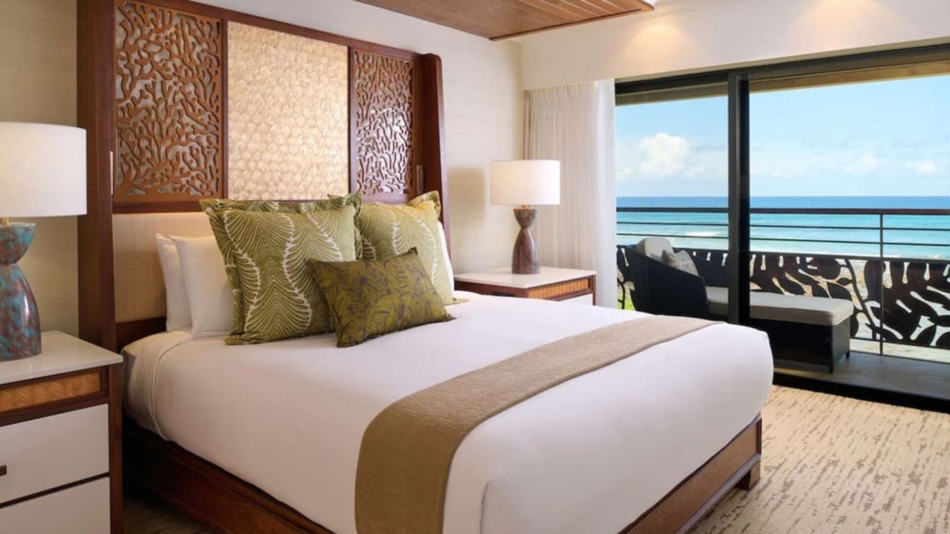 King bed at Ko'a Kea Resort On Po`ipu Beach.