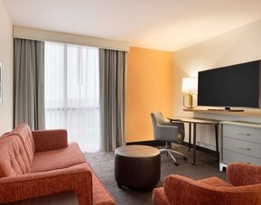 Lounge and TV at DoubleTree By Hilton Fort Worth South.