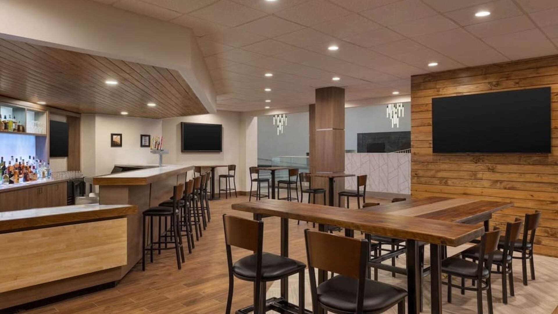 Coworking area and bar at DoubleTree By Hilton Fort Worth South.