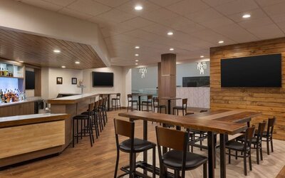 Coworking area and bar at DoubleTree By Hilton Fort Worth South.