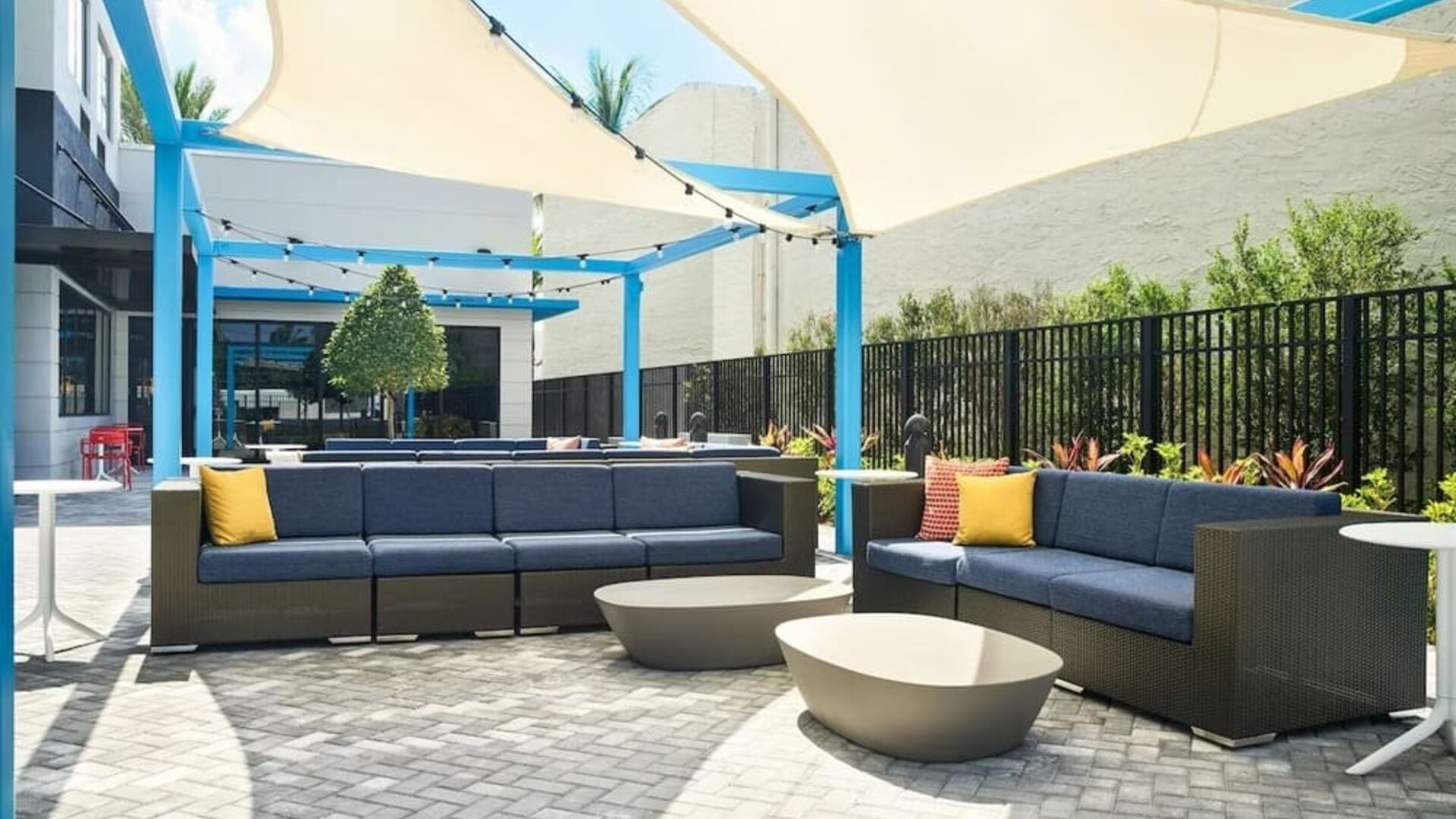 Outdoor seating at Tru By Hilton Ft. Lauderdale Airport.