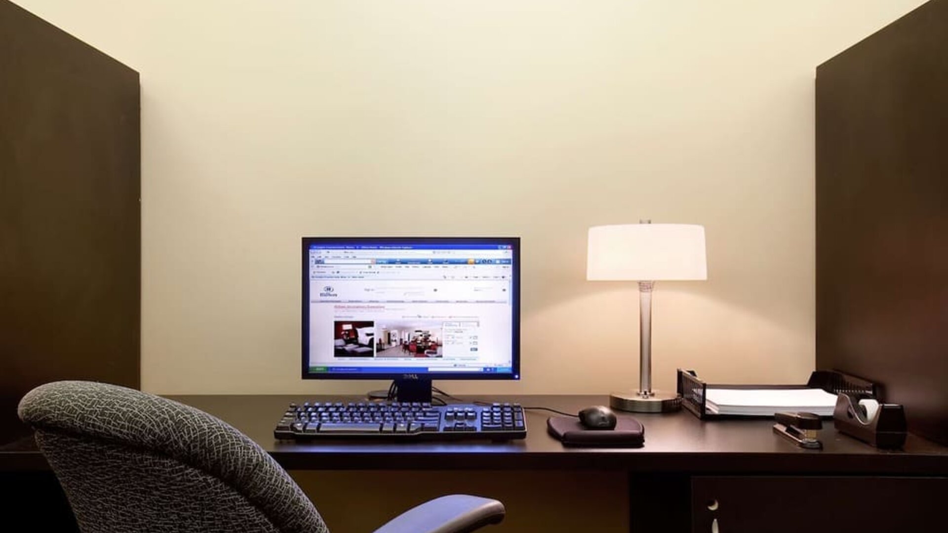 Business center with computer, printer and ergonomic chair at Hilton Orrington/Evanston.