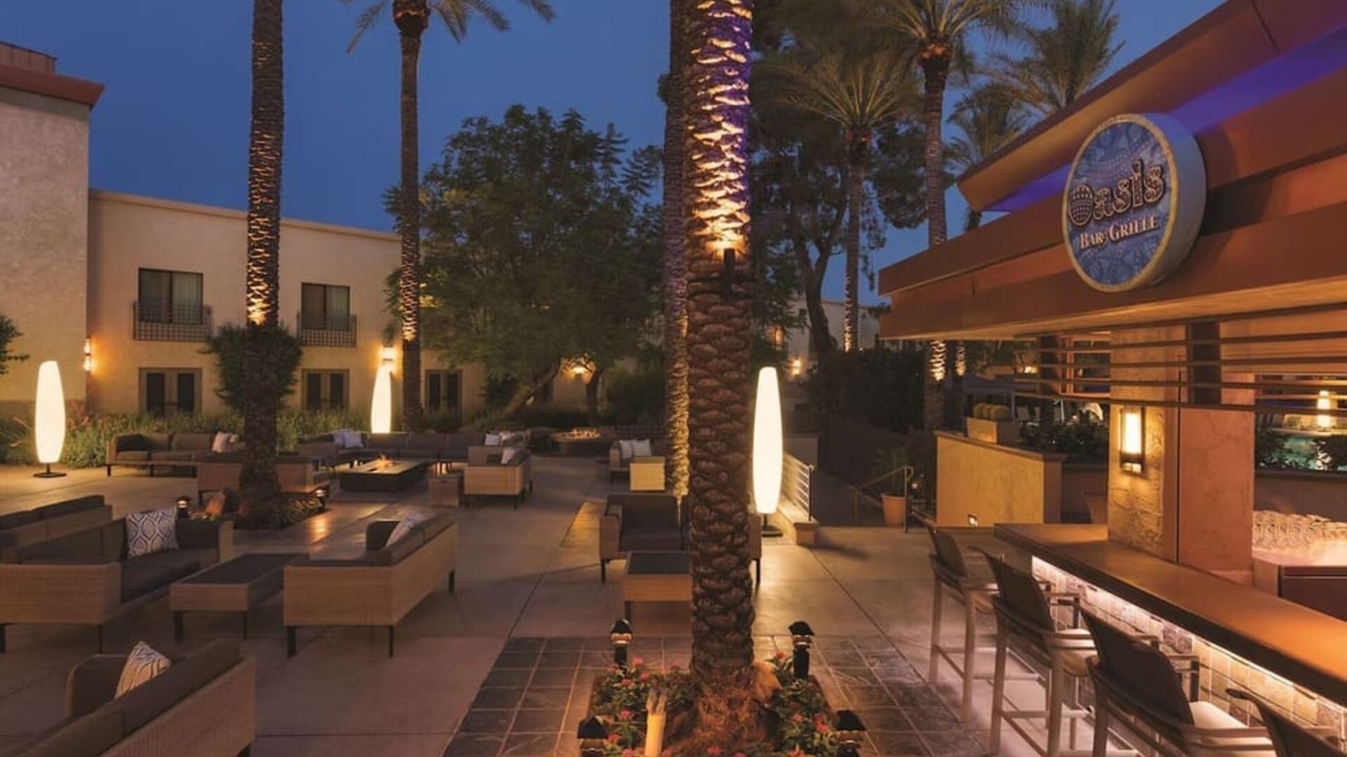Hotel patio and pool bar at Hilton Scottsdale Resort & Villas.