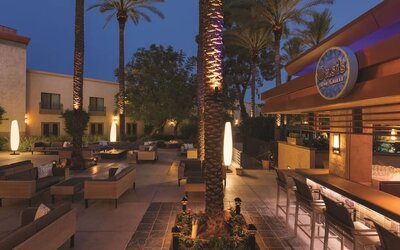 Hotel patio and pool bar at Hilton Scottsdale Resort & Villas.