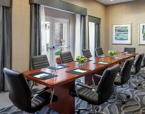 Professional meeting room with ergonomic chairs at Homewood Suites By Hilton Agoura Hills.