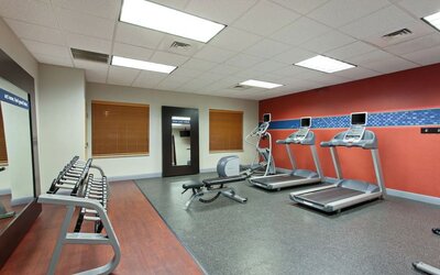 Well equipped fitness center at 	Hampton Inn & Suites Clovis-Airport North.