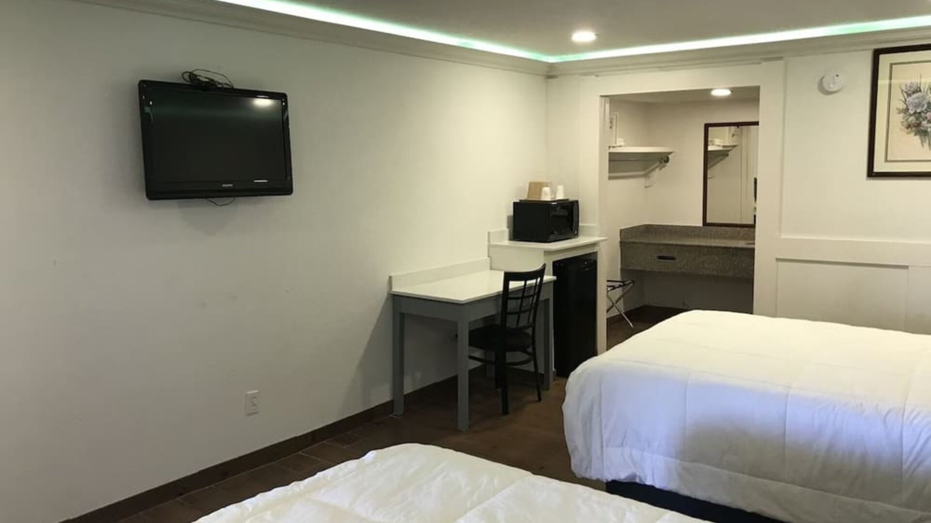 Queen beds with TV at Star Inn Hotel Sea World.