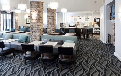 Dining area with comfortable seating perfect for coworking at Homewood Suites By Hilton San Jose Airport-Silicon Valley.