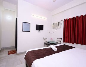 King room at Hotel NoVo Agra.