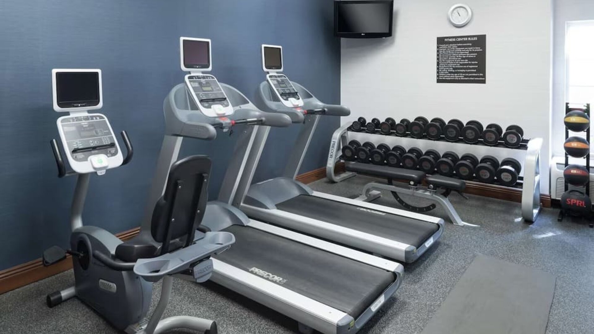Well equipped fitness center at Homewood Suites By Hilton Fresno Airport/Clovis.