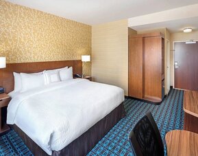 King room with work desk and TV at Fairfield Inn & Suites By Marriott North Bergen.