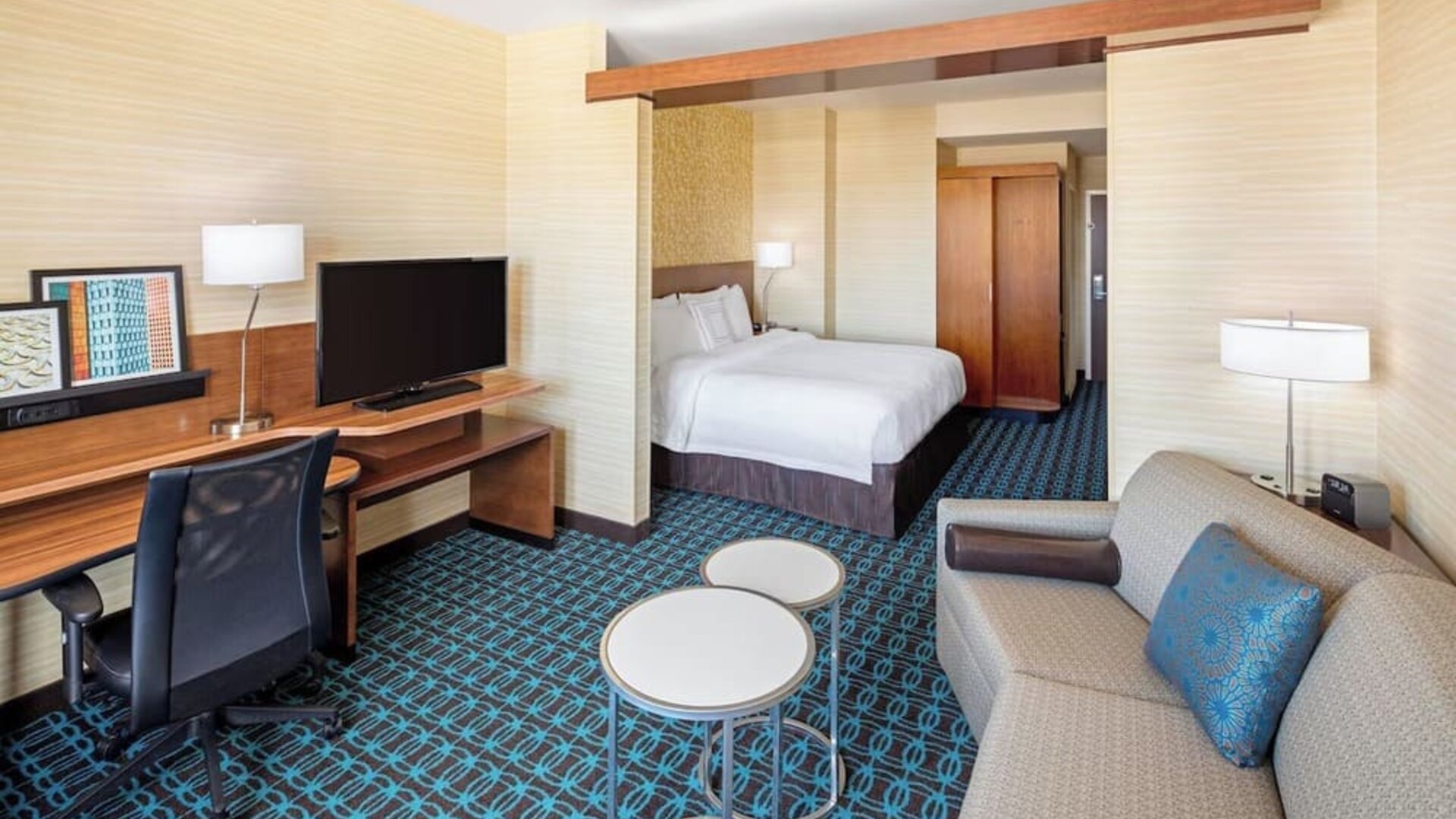 King room with work desk and TV at Fairfield Inn & Suites By Marriott North Bergen.