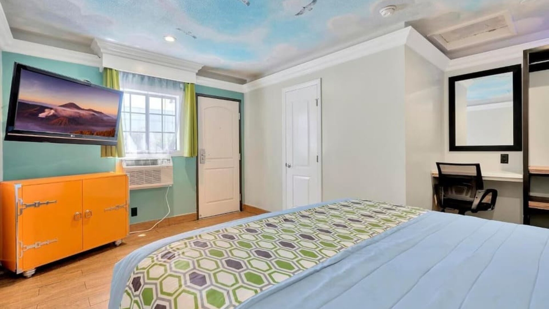 King room with TV at Mid City Inn - Los Angeles.