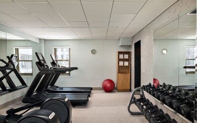 Well equipped fitness center at Kimpton Theta New York - Times Square.