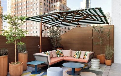 Terrace lounge seating at Kimpton Theta New York - Times Square.