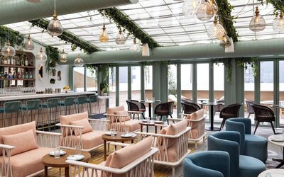 On-site restaurant with comfortable seating at Kimpton Theta New York - Times Square.