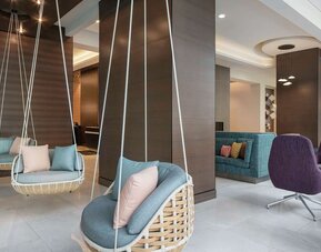 Lounge seating at 	Home2 Suites By Hilton Denver Downtown Convention Center.