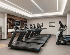 Well equipped fitness center at 	Home2 Suites By Hilton Denver Downtown Convention Center.
