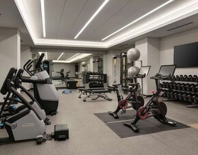 Fully equipped fitness center at 	Home2 Suites By Hilton Denver Downtown Convention Center.