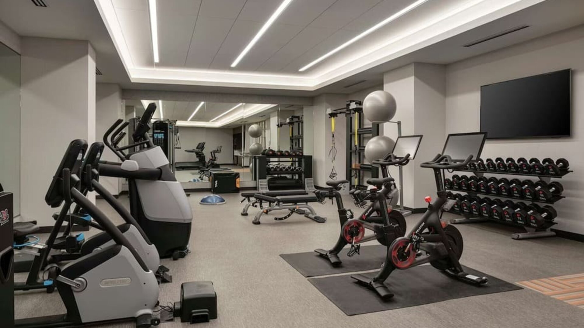 Well equipped fitness center at Tru By Hilton Denver Downtown Convention Center.