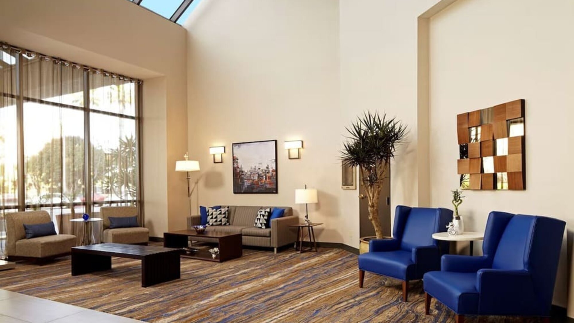 Lobby lounge at Embassy Suites By Hilton Los Angeles-Intl Airport North.