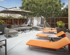 Lounge chairs at Crowne Plaza Dallas Market Ctr - Love Field.