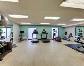 Fully equipped fitness center at Sonesta Select Scottsdale At Mayo Clinic Campus.